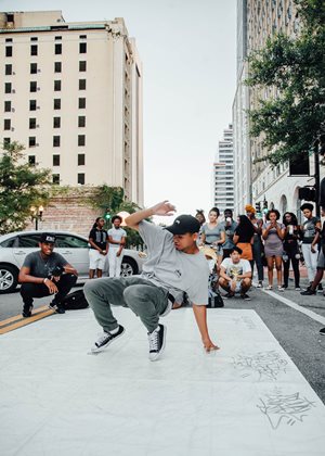 Photo of people dancing in the streets of Downtown Jax